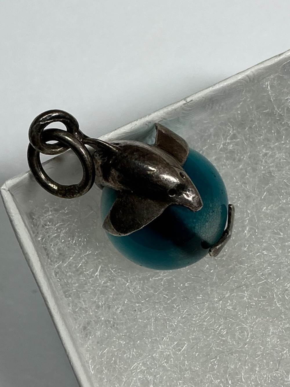 Sterling Silver Dolphin 🐬 Pendant on a Blue Glass Orb.